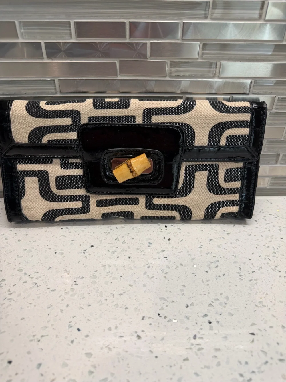 Sondra Roberts Black and Cream Geometric Canvas Clutch with Bamboo Accent
